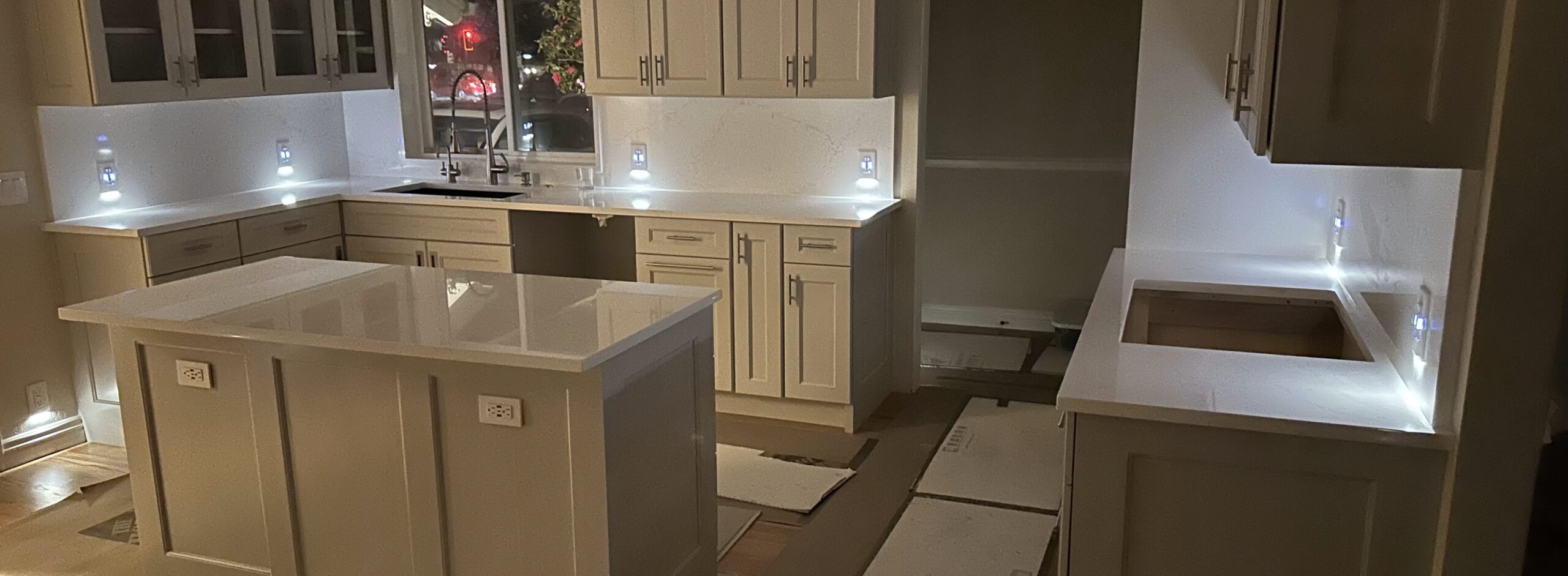 Kitchen remodel electrical work completed by MP Electric, including under-cabinet lighting and new outlets throughout